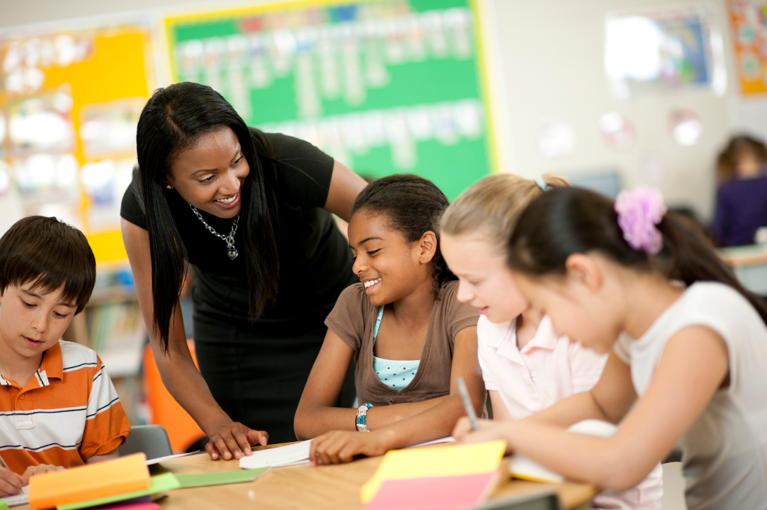 A diverse group of children in a classrooom. A diverse group of children in a classrooom.